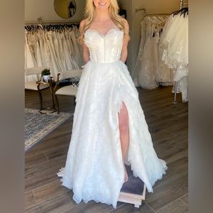 Brand new, custom private label wedding dress.